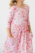 Child wearing the Azalea pocket twirl dress