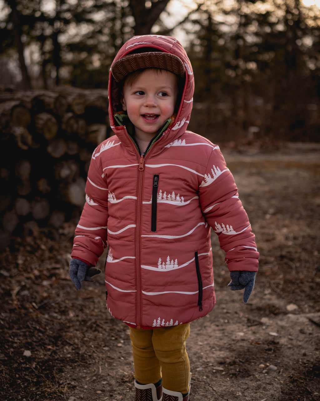 Child wearing the Hills lightweight reversible puffy jacket