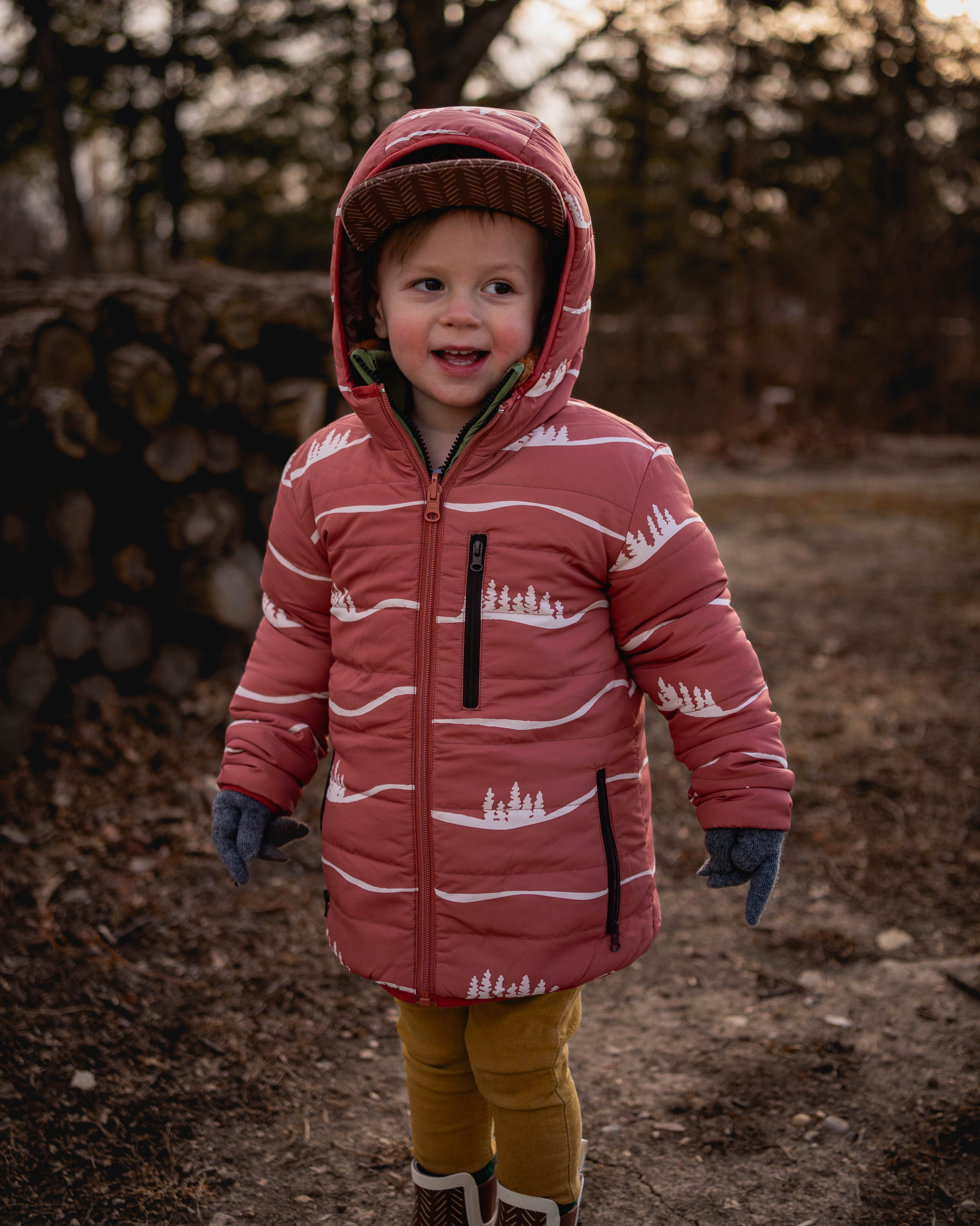Child wearing the Hills lightweight reversible puffy jacket